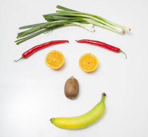 Vrolijk gezicht van groenten en fruit