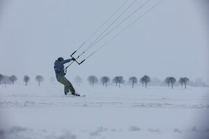 Snowkiten in de sneeuwstorm