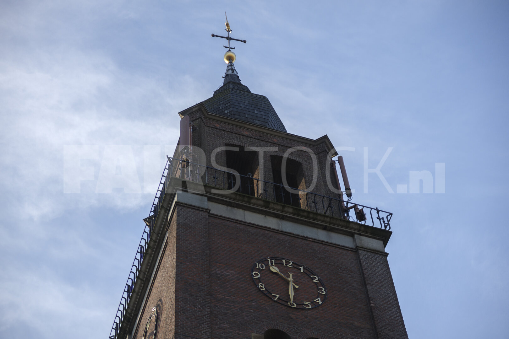 Clock tower in Noord-Brabant reflecting the charm of Dutch archi